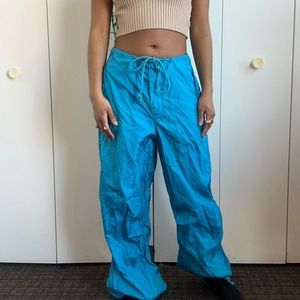 Turquoise parachute pants